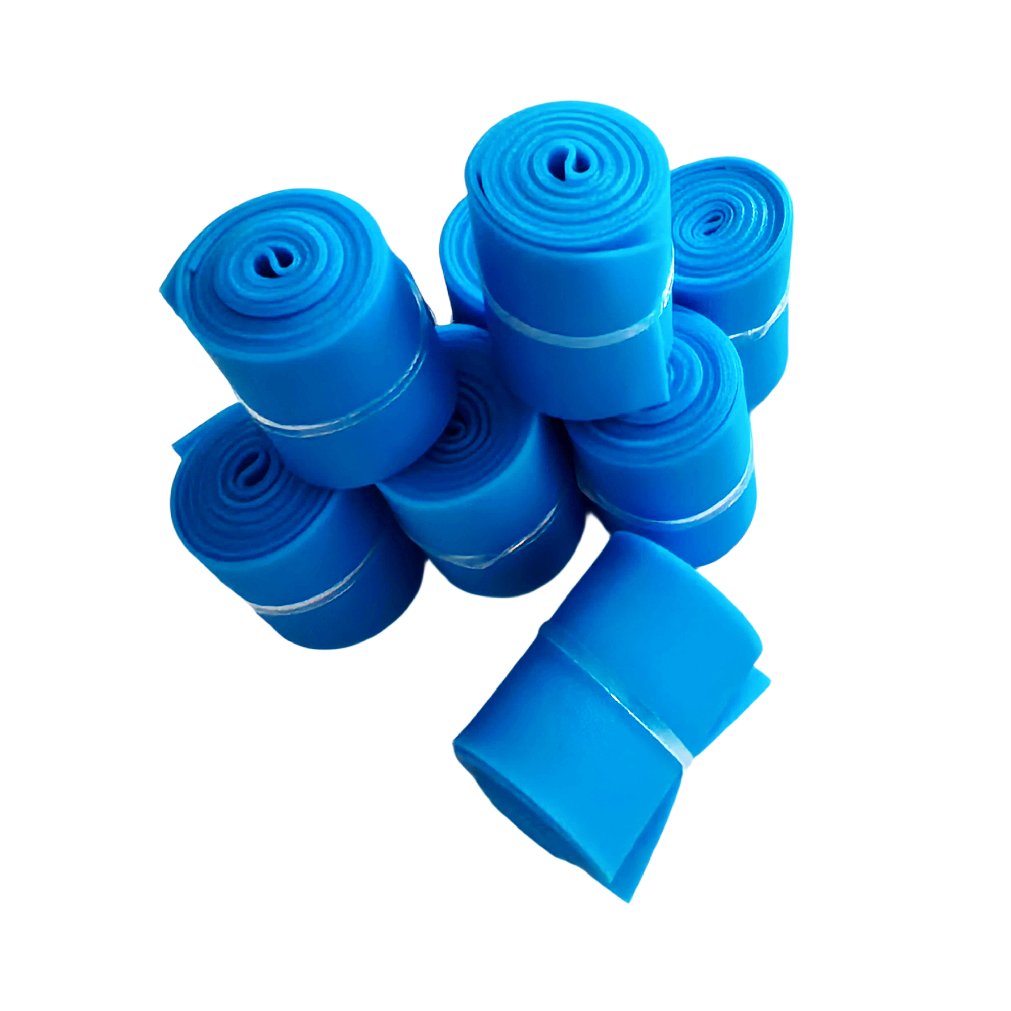 Several rolls of blue disposable tourniquet strips