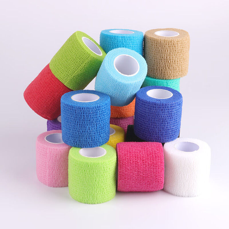 Alternate stack of colorful self-adhesive bandage rolls