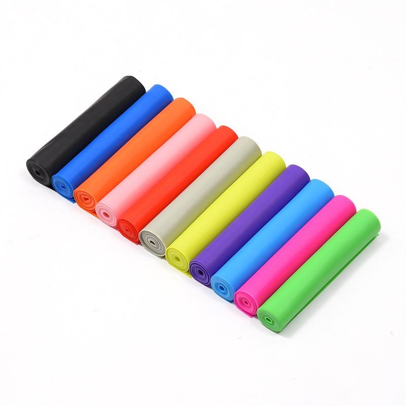 Alternate arrangement of rolled TPE resistance bands in multiple colors