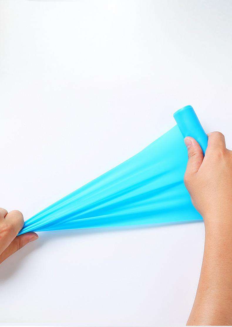 Hands extending a blue resistance band against a white background