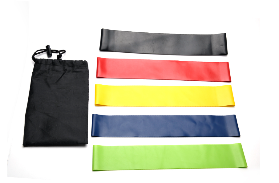 Five colored resistance loops arranged beside a black storage pouch