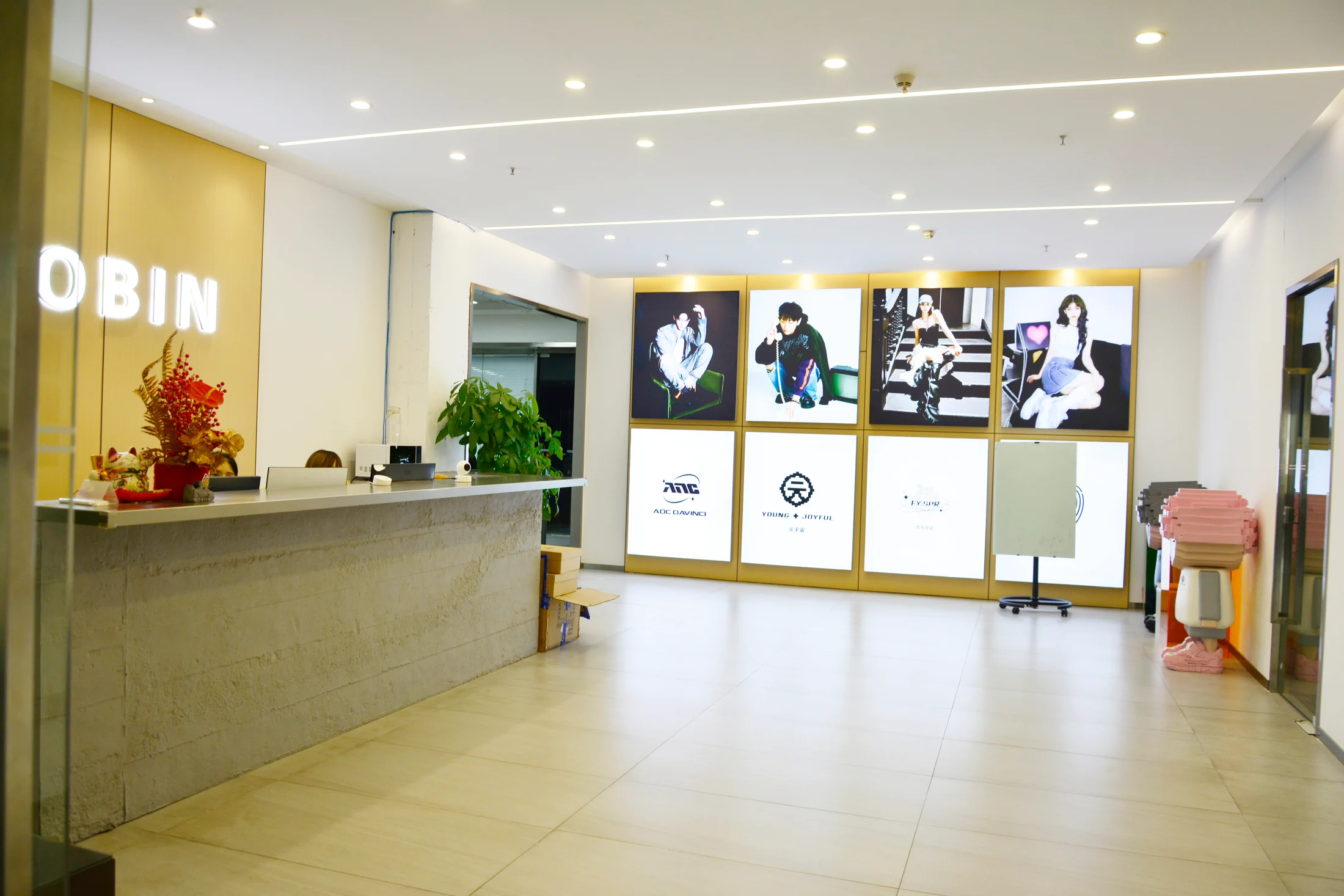 ADCDAVINCI reception and brand display wall inside the Guangzhou office