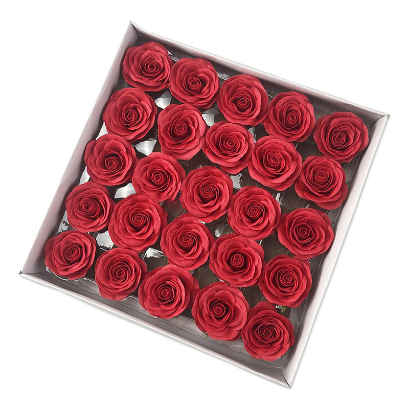 Tray of rose heads in pink and red tones