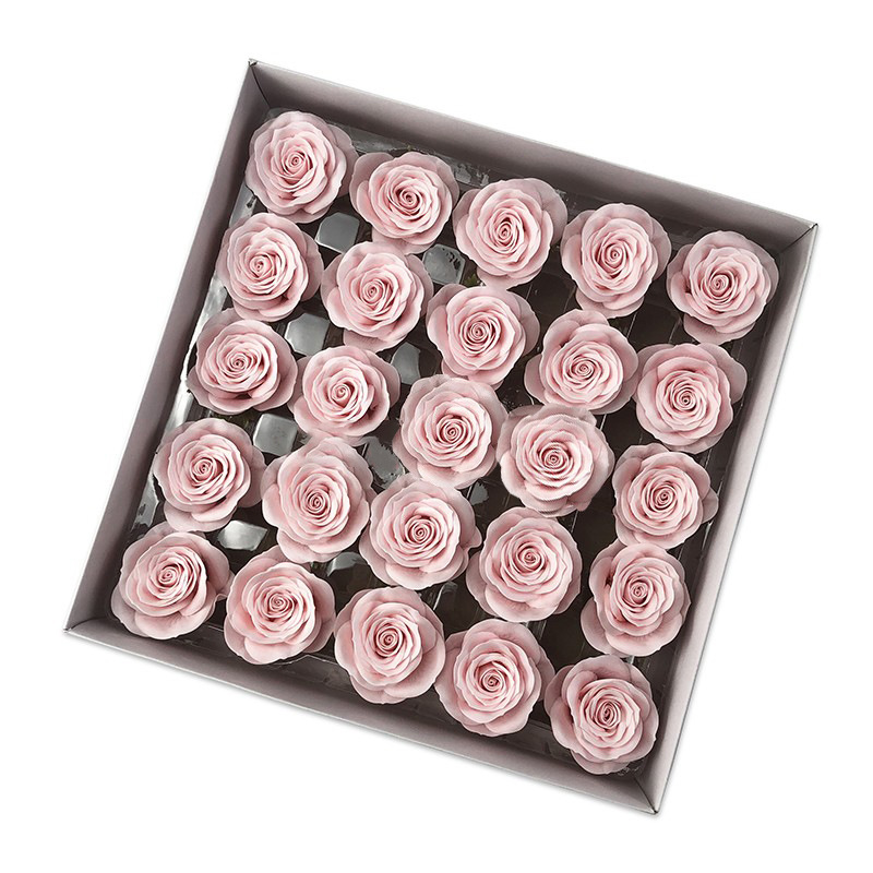 Tray of rose heads in pink and red tones