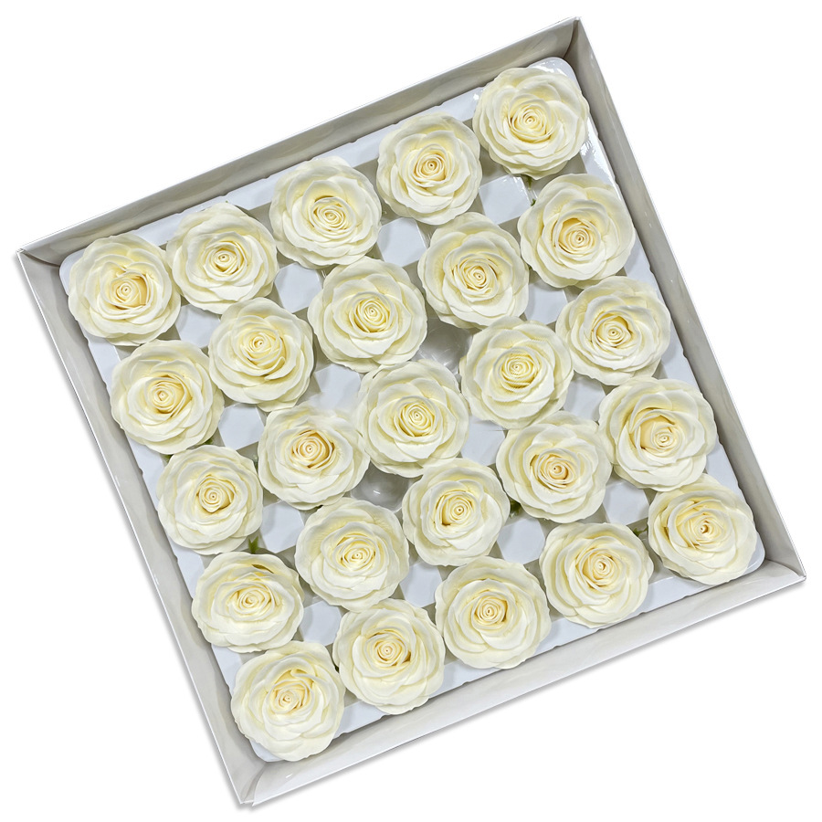 Tray of rose heads in cream, peach and amber tones