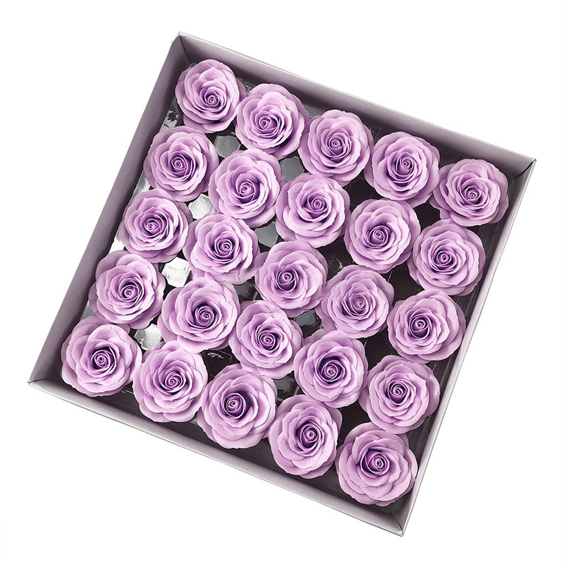 Tray of rose heads in purple and lavender tones