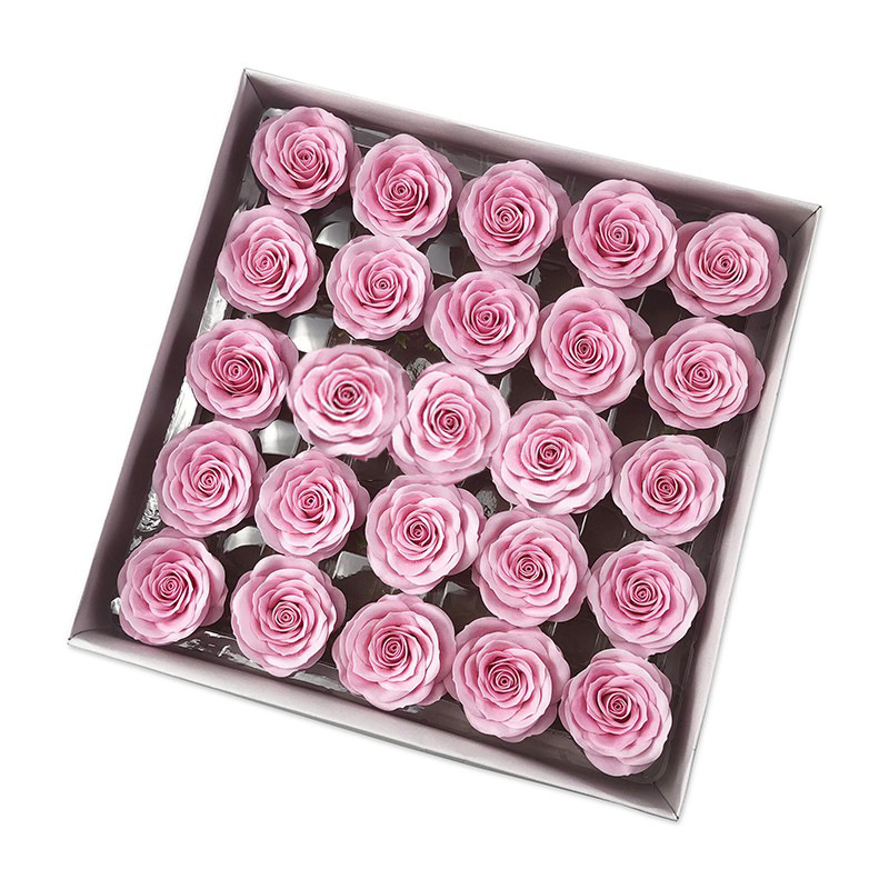 Tray of rose heads in pink and red tones