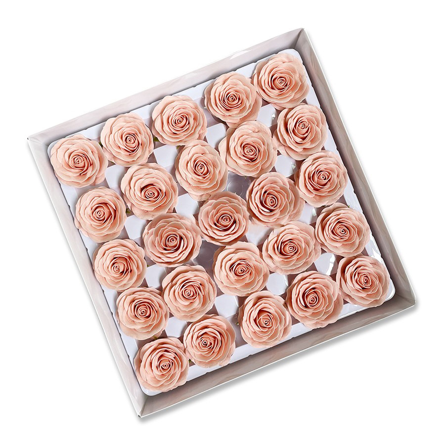 Tray of rose heads in cream, peach and amber tones
