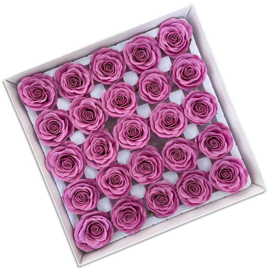Tray of rose heads in pink and red tones