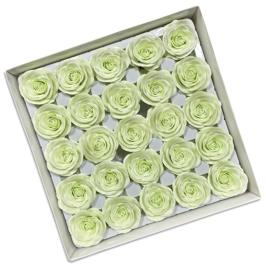 Tray of rose heads in green tones