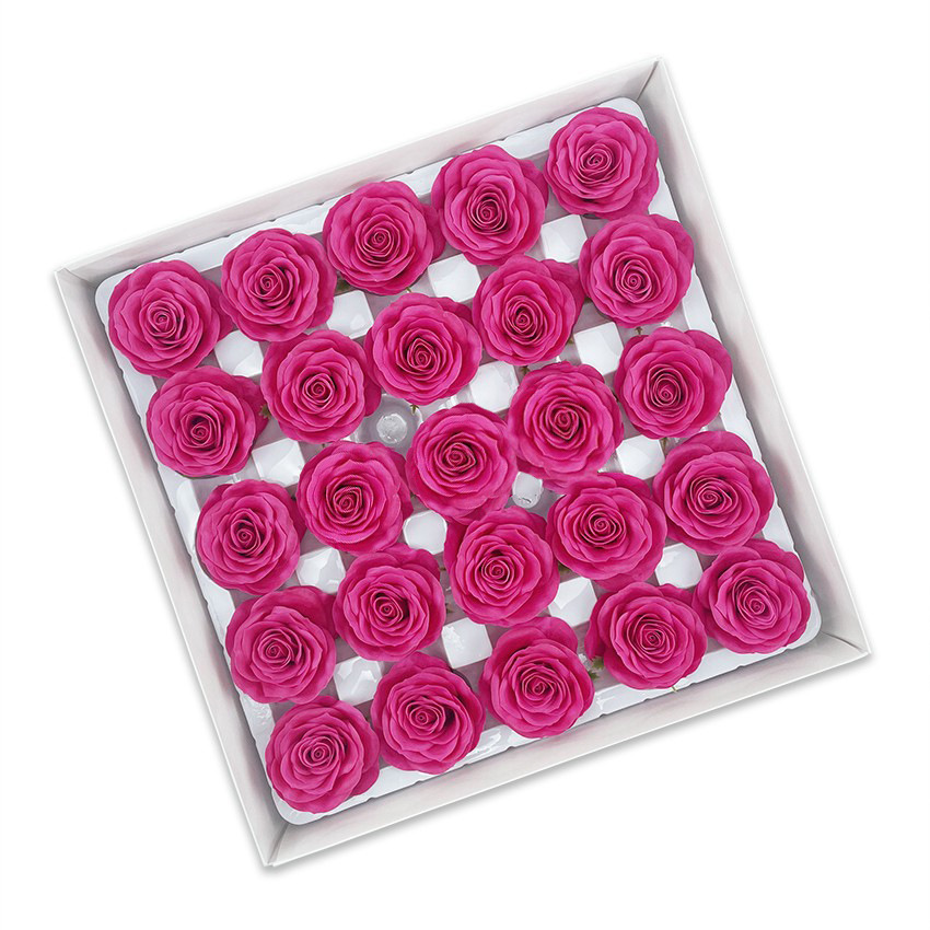 Tray of rose heads in pink and red tones
