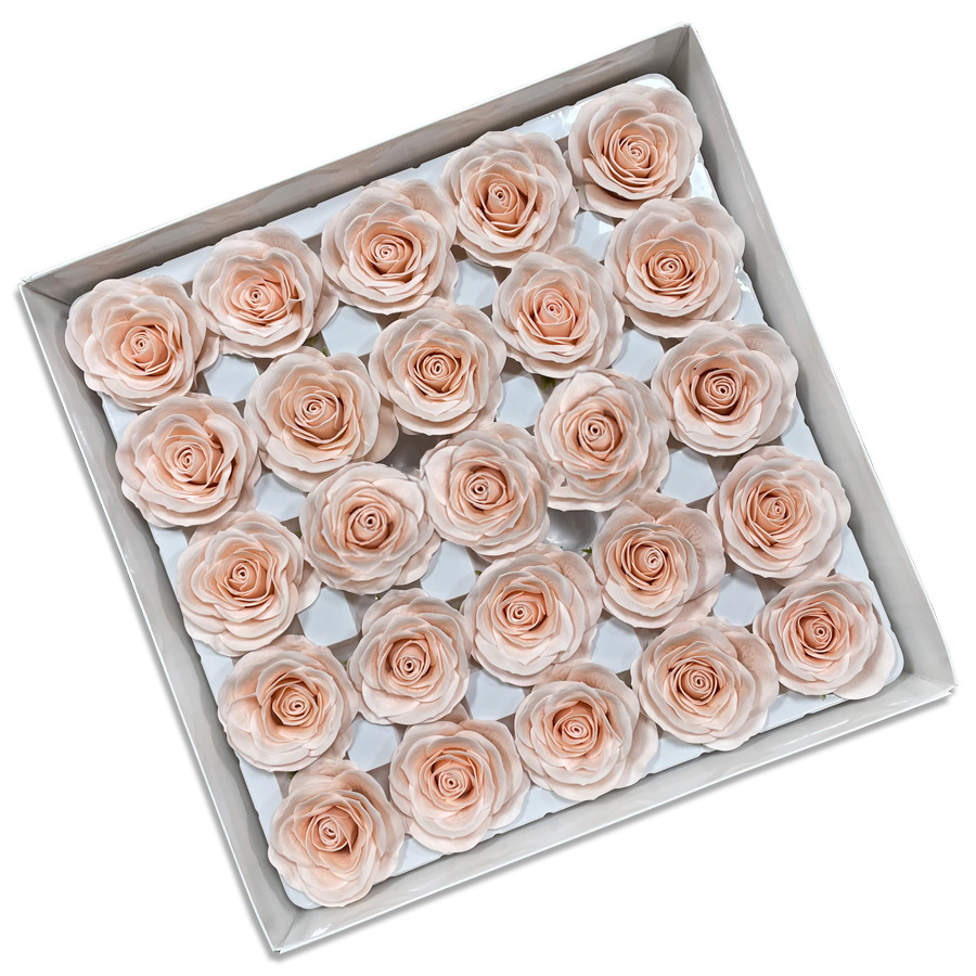 Tray of rose heads in cream, peach and amber tones