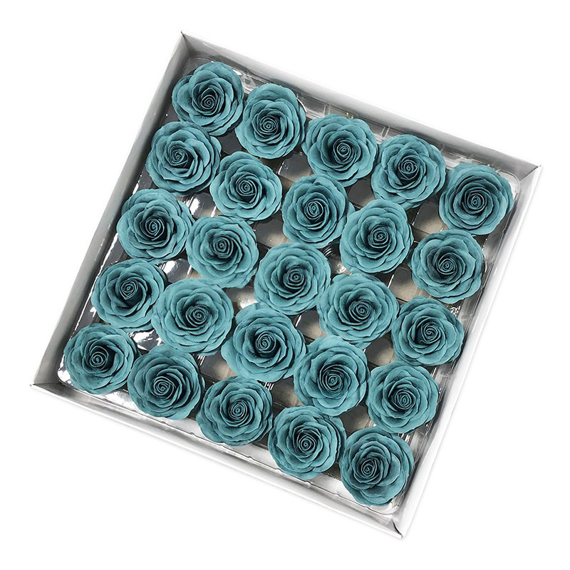 Tray of rose heads in blue and teal tones