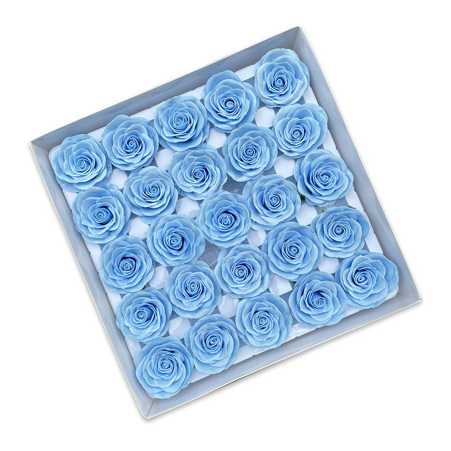 Tray of rose heads in blue and teal tones