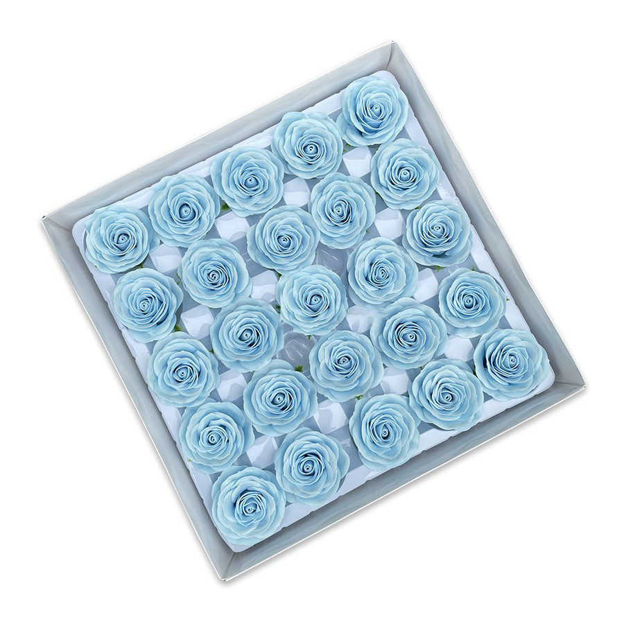 Tray of rose heads in blue and teal tones