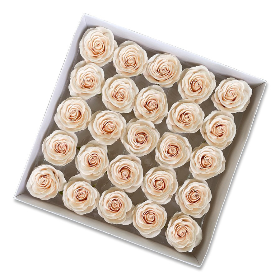 Tray of rose heads in cream, peach and amber tones
