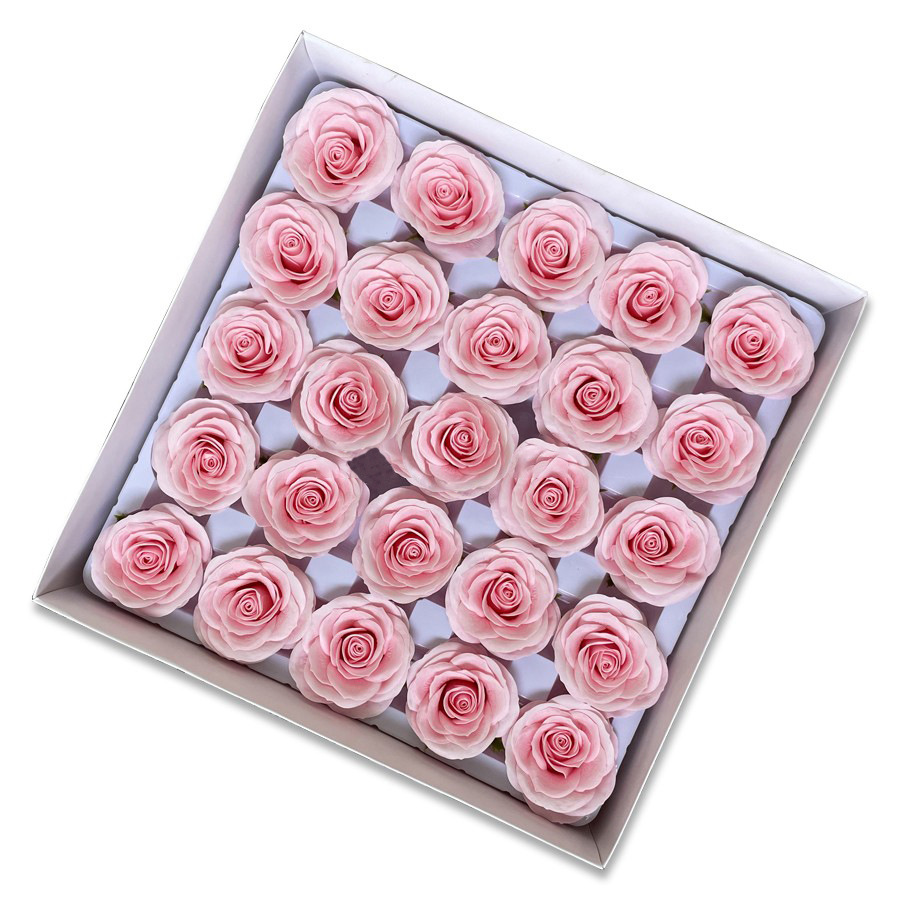 Tray of rose heads in pink and red tones