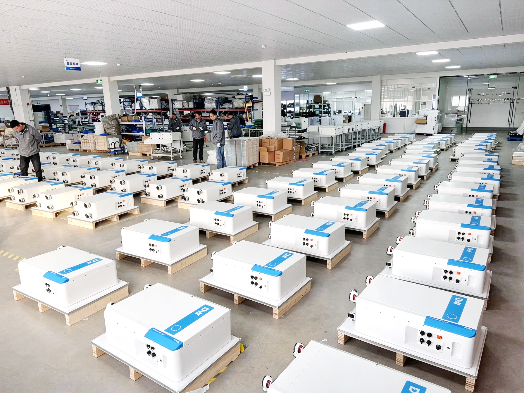 Rows of DW energy storage units on the production floor during aging-charge testing