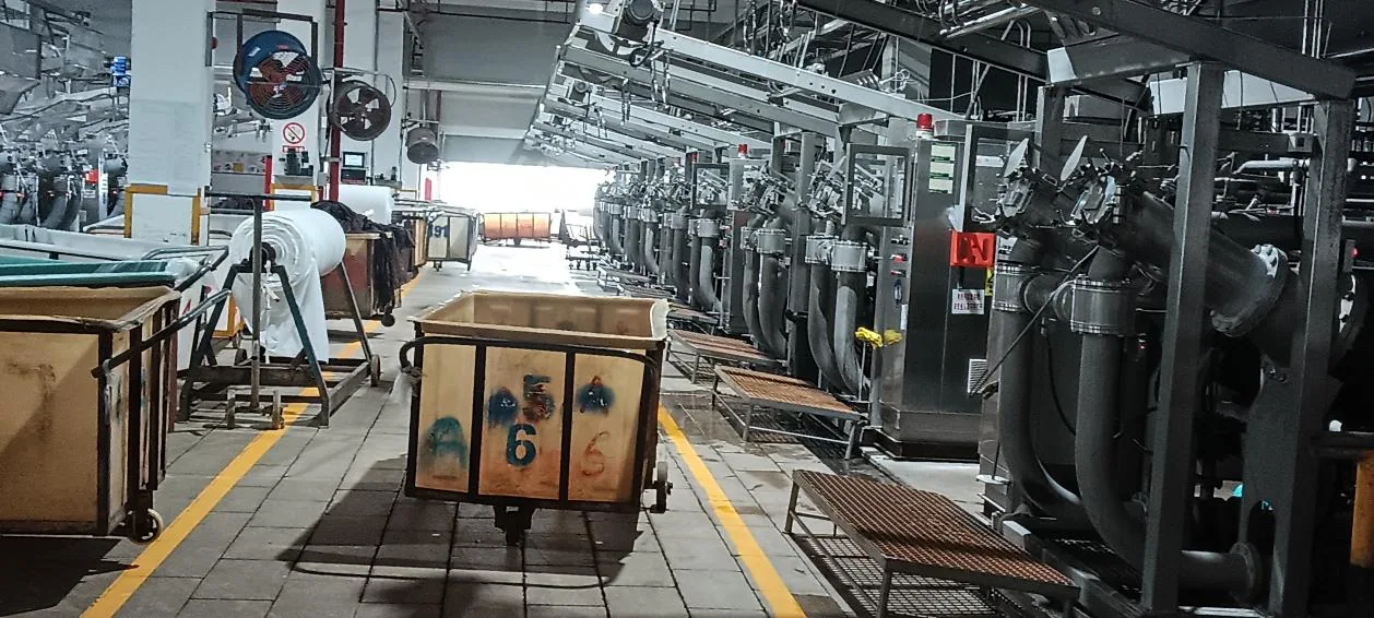 Customer supplied view of textile equipment and fabric handling