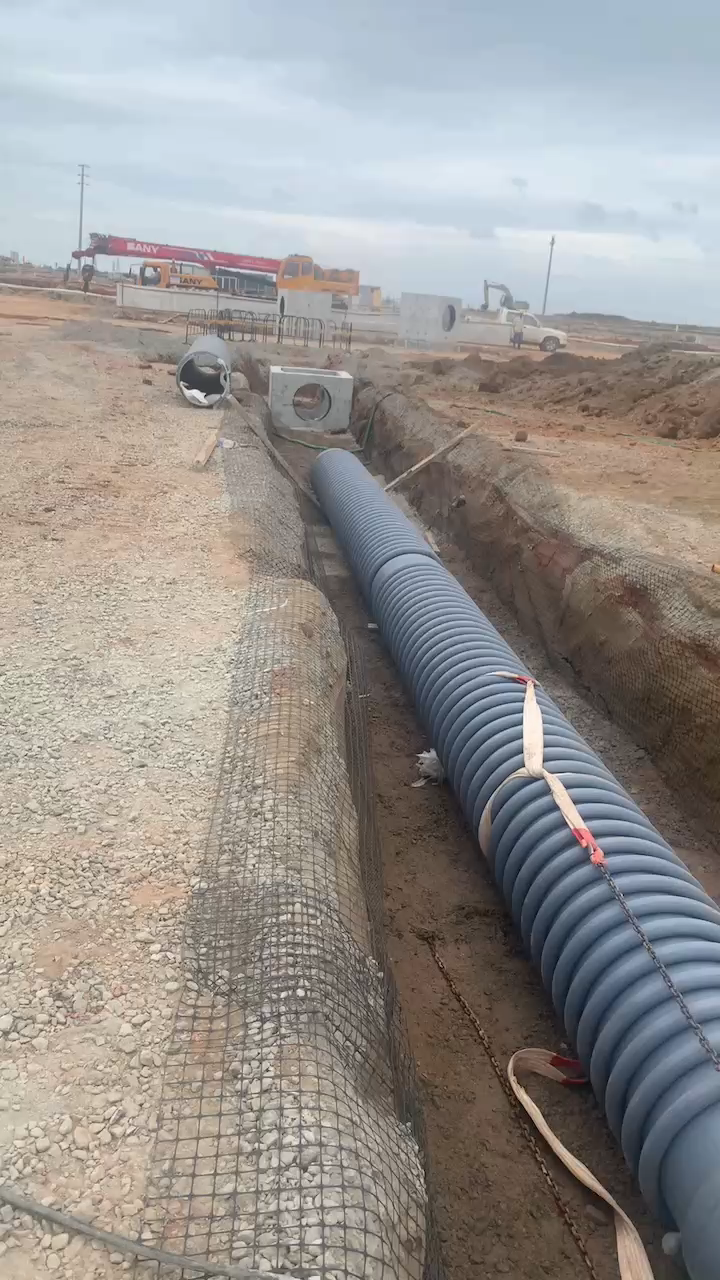 Long pipe run placed in an open excavation.