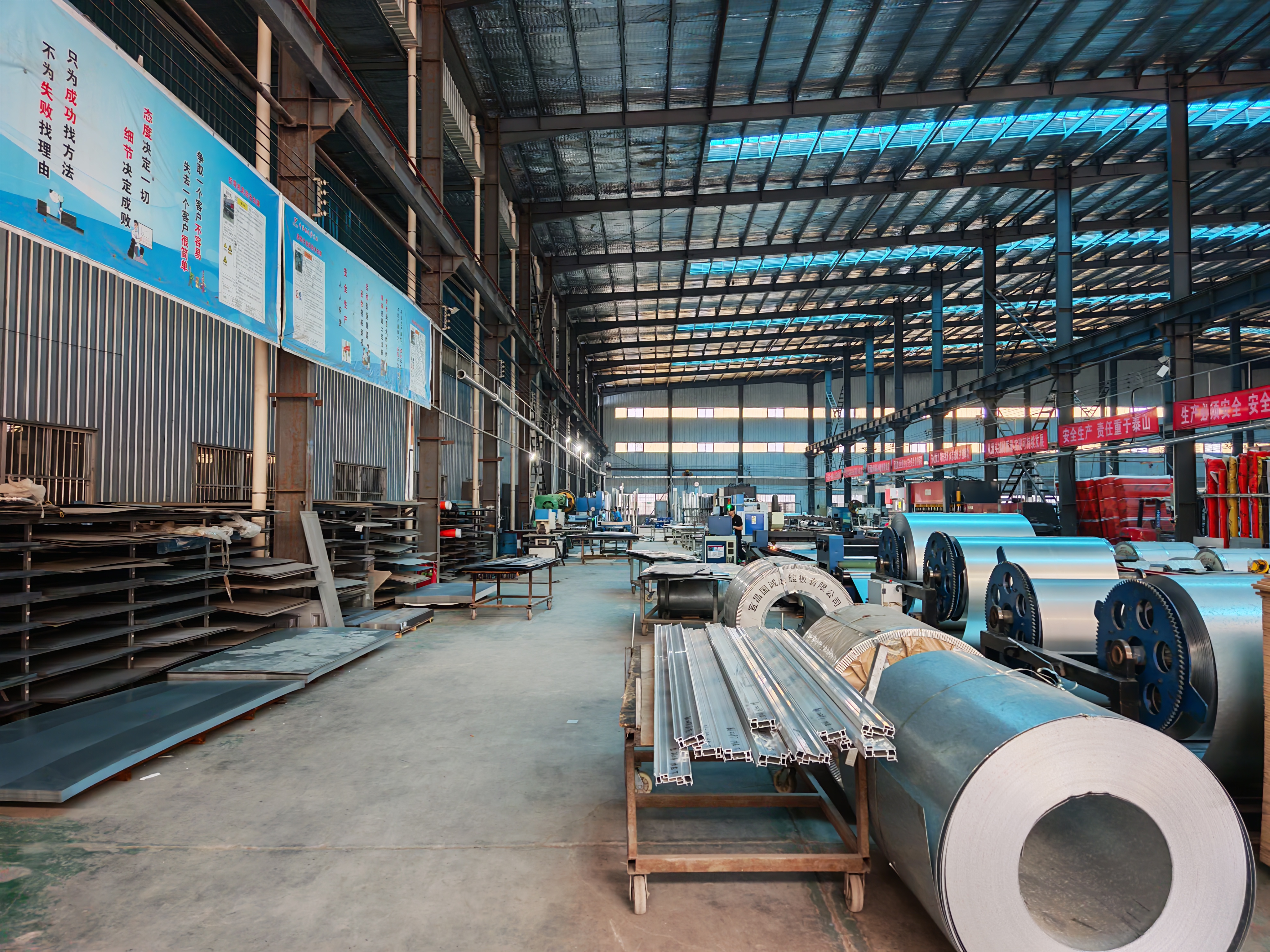 Workshop floor with door units in various stages of assembly