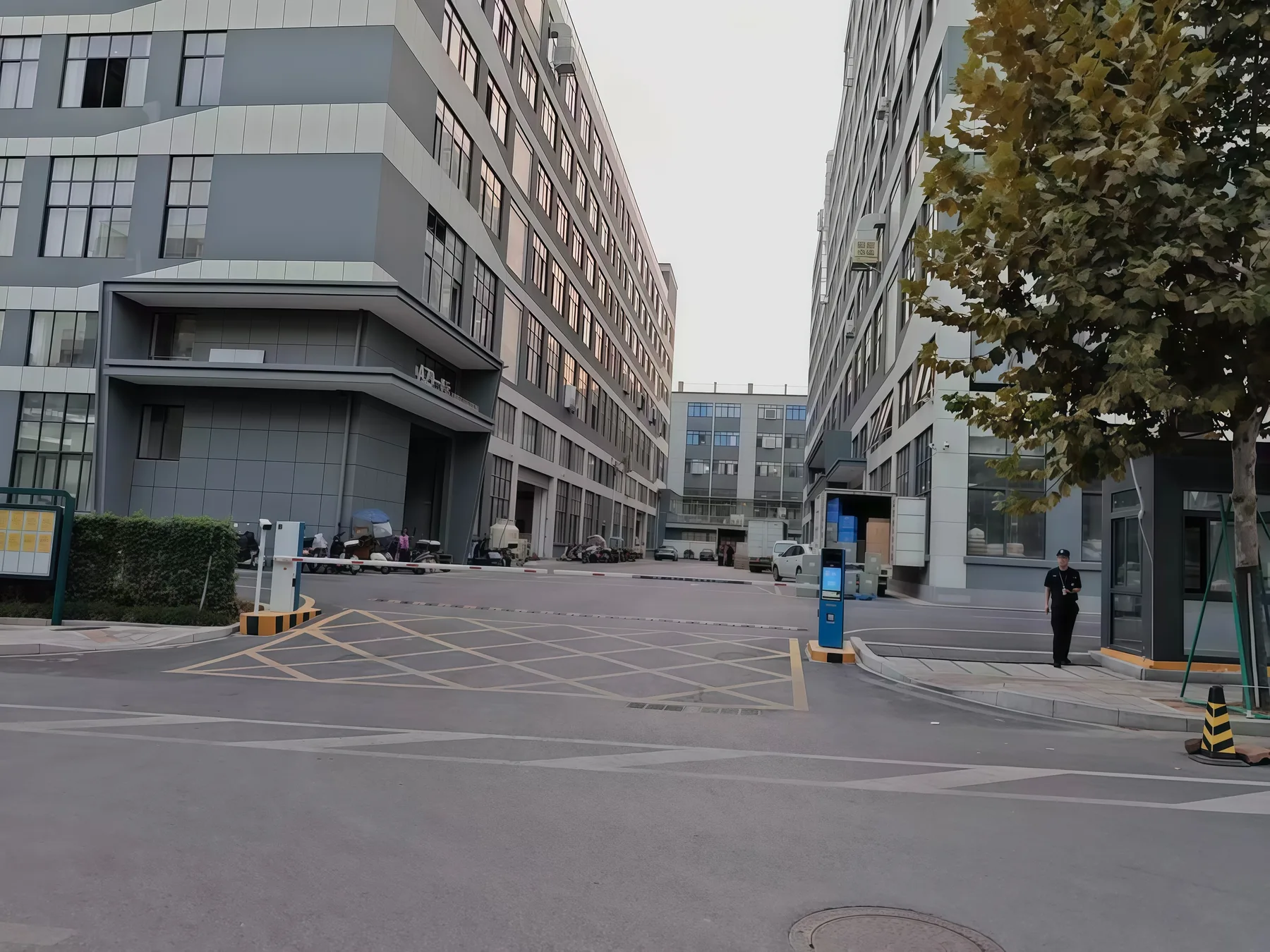 Courtyard between industrial buildings in customer materials