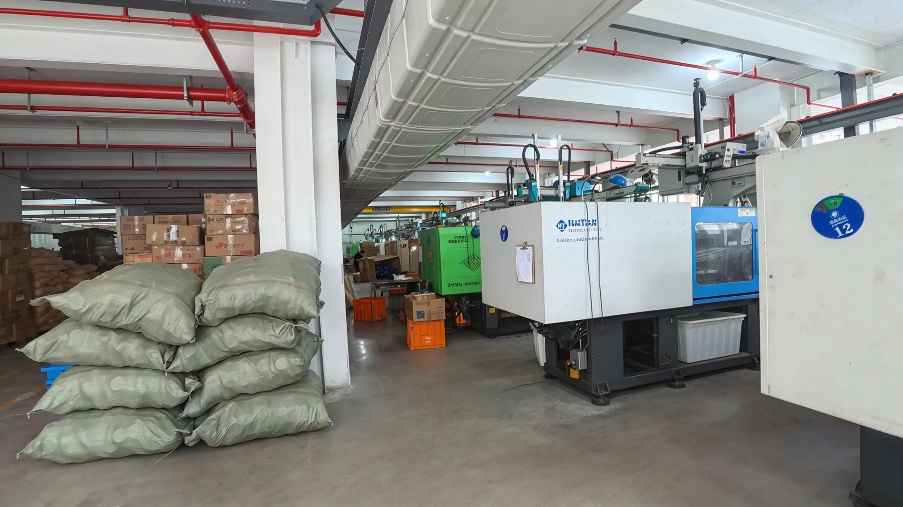 Machinery and materials along a workshop aisle
