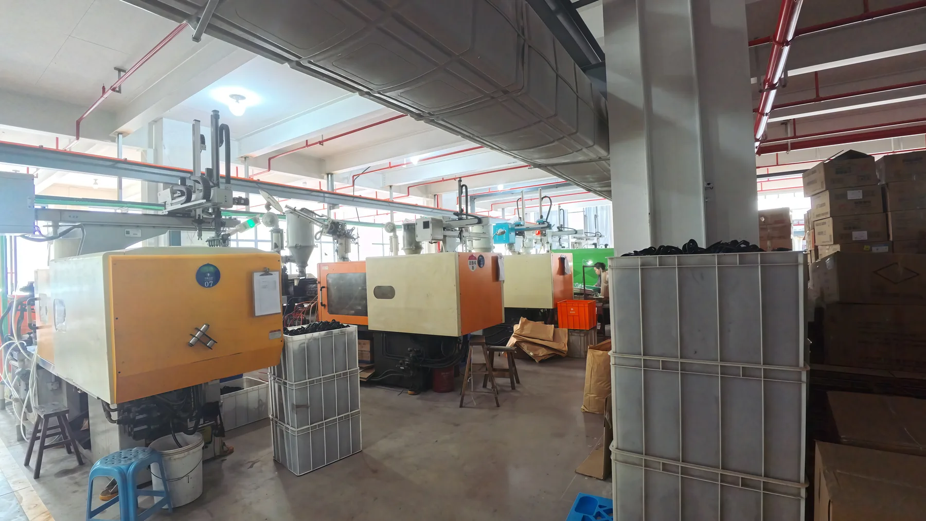 Side view of machines on the production floor