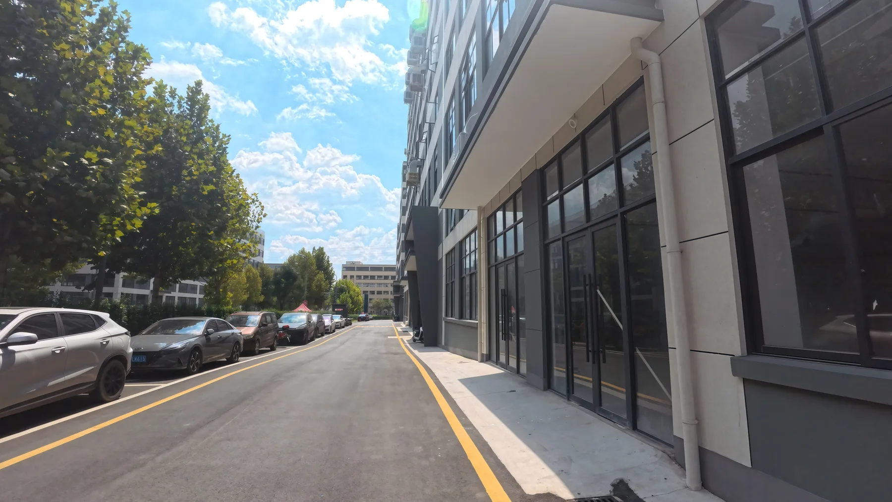 Road and industrial building exterior in customer materials