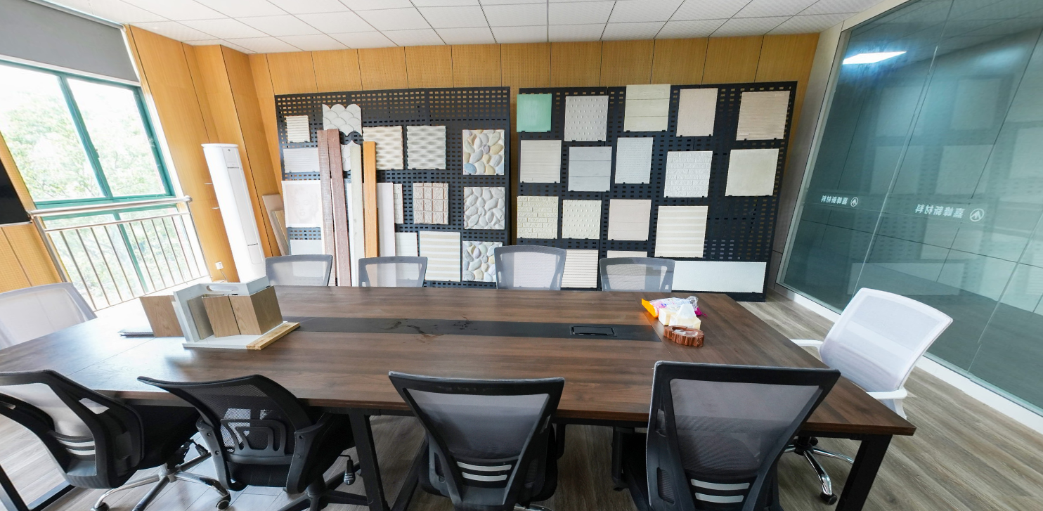 Meeting room with documents displayed on the back wall