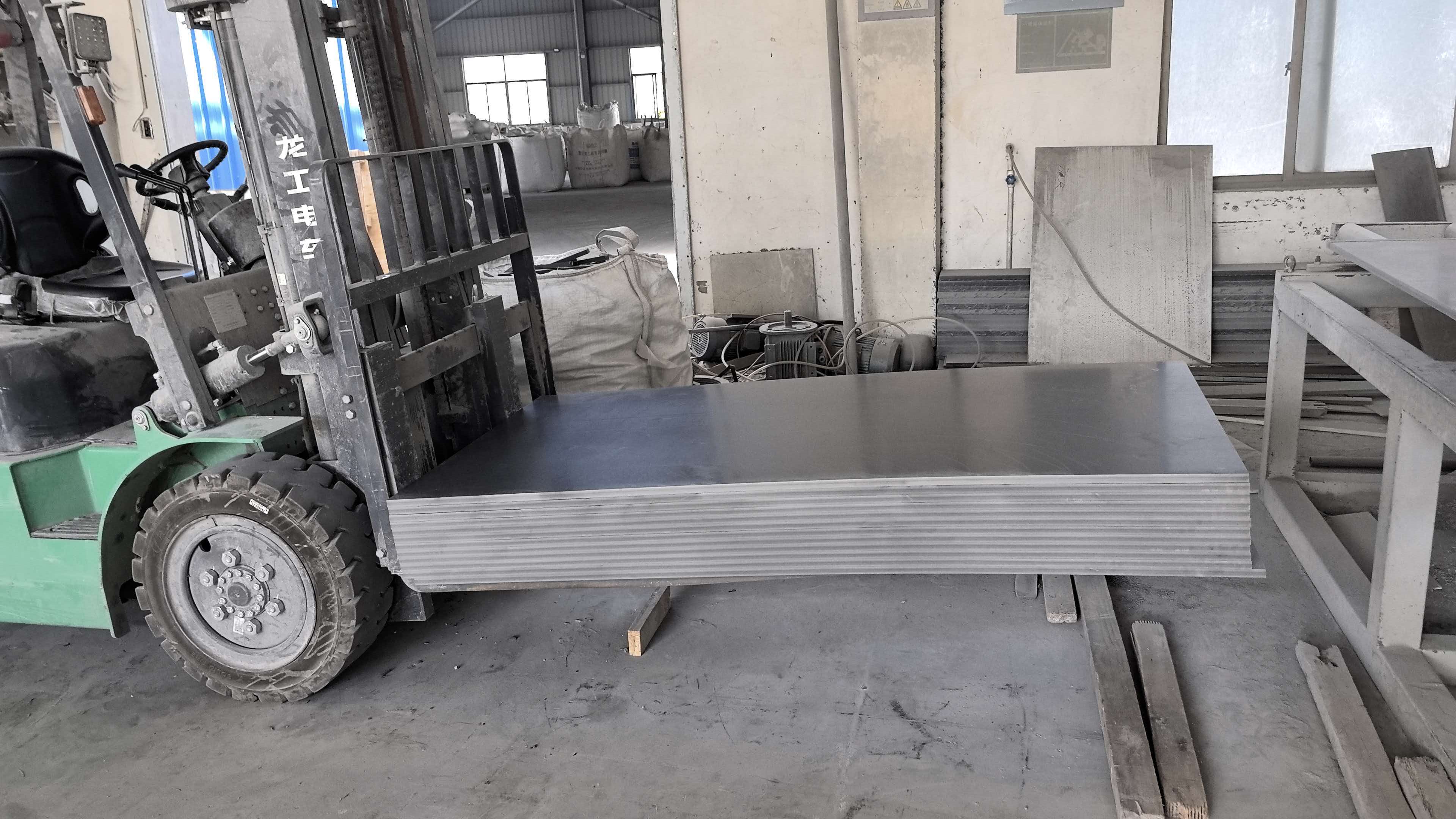 Handling sheet material in the factory