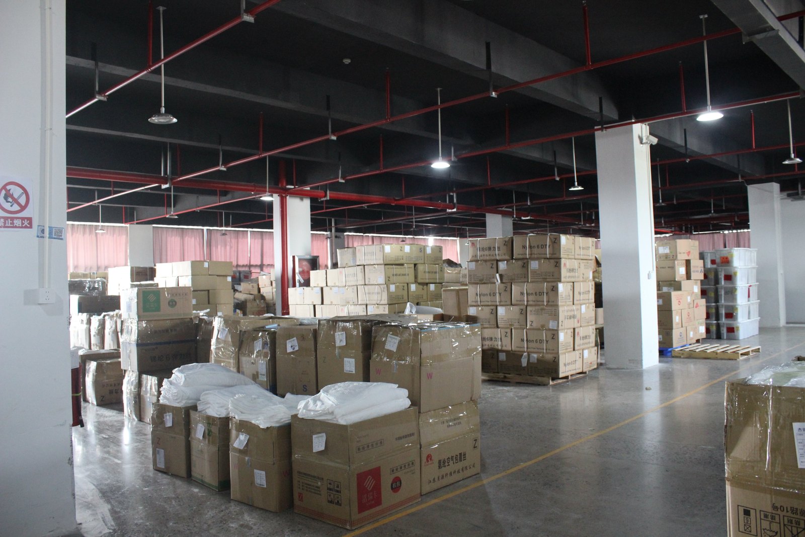 Materials and packed cartons in the storage area