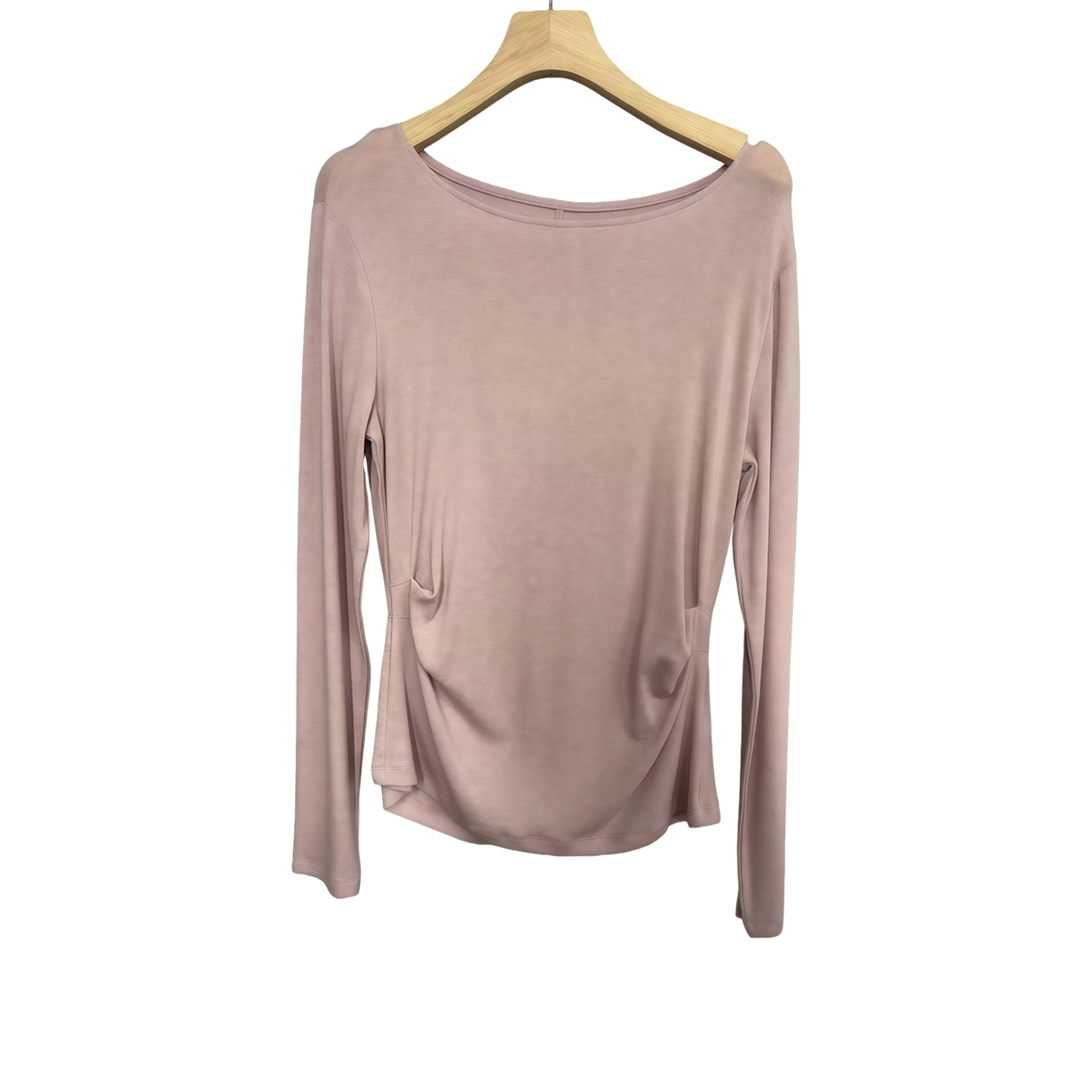 Blush long-sleeve knit top shown from the back