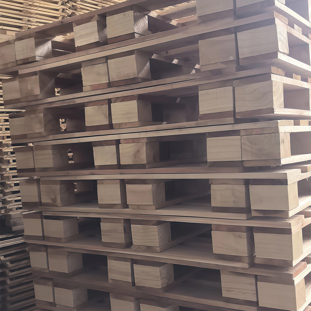 Close-up of timber blocks on a solid wooden pallet