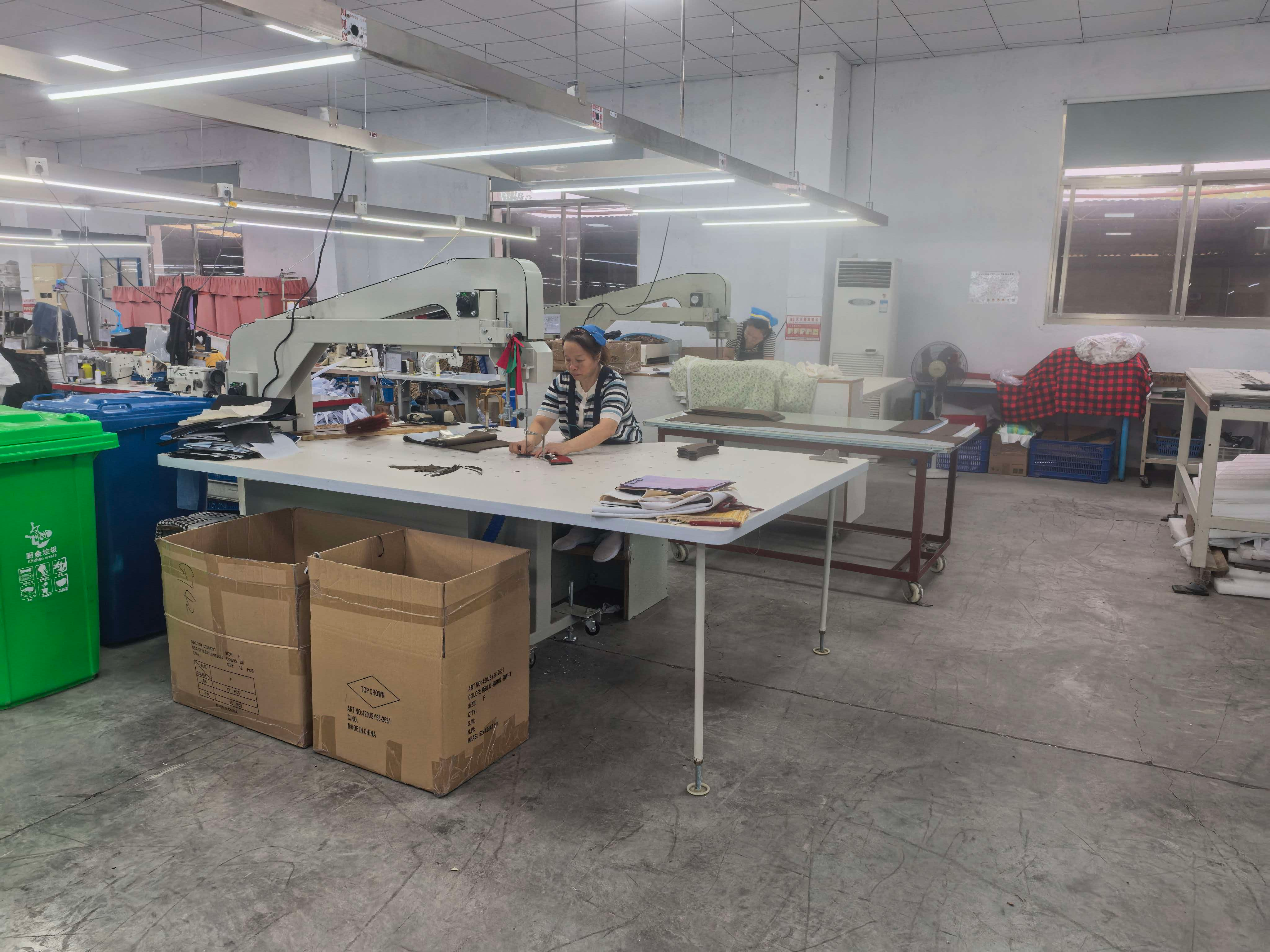 Customer supplied photograph: work tables and materials
